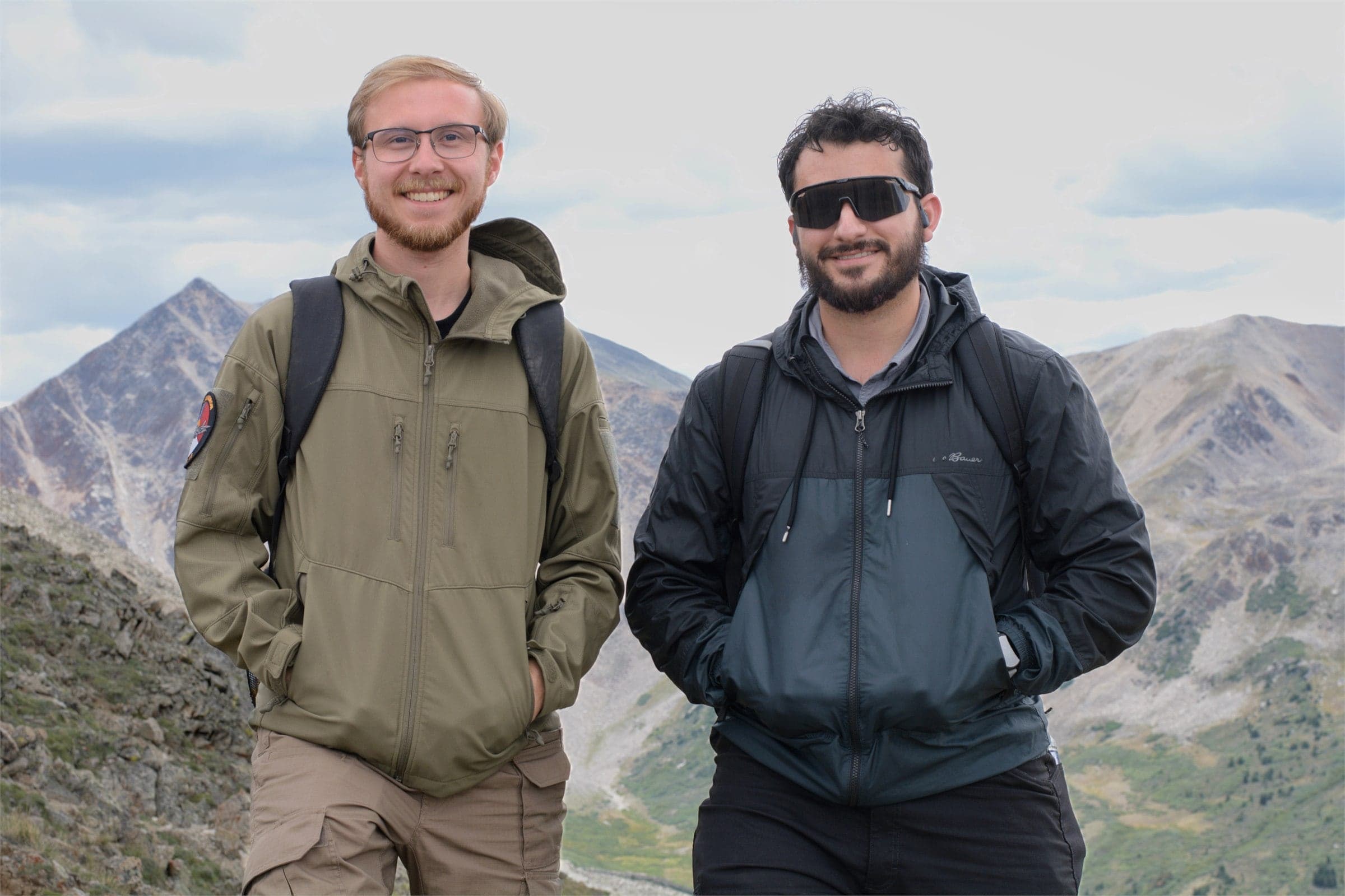 The two owners of H&N Mobile Detailing outdoors in the mountains